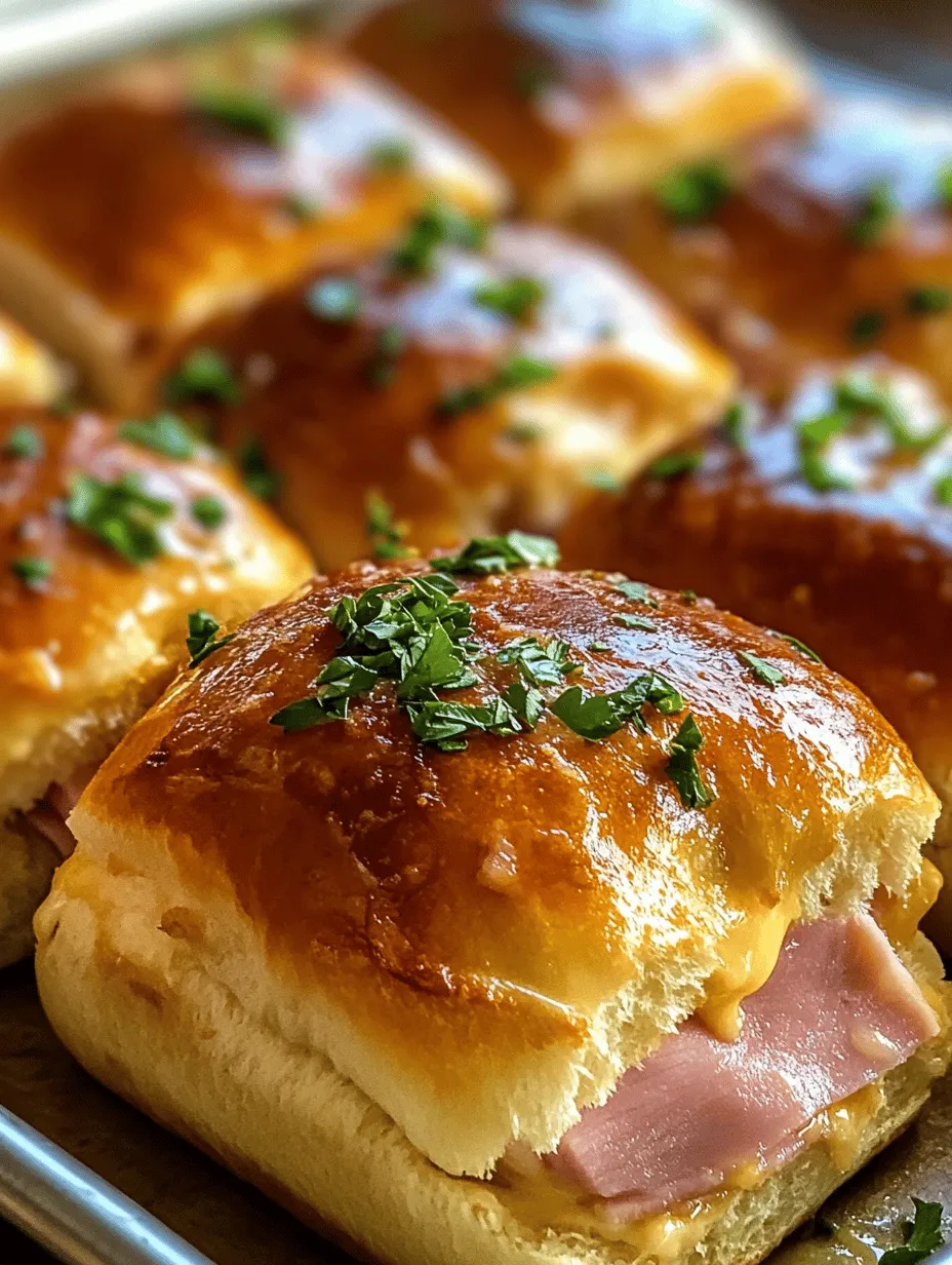 If you're on the lookout for a delicious and easy-to-make dish that will impress your family and friends, look no further than Savory Ham & Cheese Sliders Delight. These delightful sliders combine the perfect balance of savory ham, gooey melted Swiss cheese, and a buttery topping that makes them irresistibly tasty. Whether you're hosting a game day gathering, a casual family dinner, or simply craving a snack, this recipe is the epitome of comfort food that can be prepared in a flash.