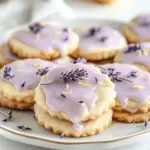 If you're looking for a sweet treat that’s as delightful to the palate as it is to the eyes, then Iced Lemon Lavender Shortbread Cookies are the perfect choice. This recipe beautifully marries the bright, zesty flavor of fresh lemons with the subtle floral notes of lavender, all enveloped in a rich buttery shortbread. The result is a cookie that is not only delicious but also visually appealing, making it an excellent addition to any dessert table.