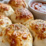 In the world of comfort food, few dishes can compete with the irresistible allure of cheesy pepperoni pizza. Its warm, gooey cheese and savory toppings create a symphony of flavors that many people crave. But what if you could take that classic flavor and transform it into a fun, bite-sized treat? Enter Cheesy Pepperoni Pizza Bombs! These little delights are a perfect fusion of all the beloved elements of pizza, packed into a convenient and easy-to-eat format.