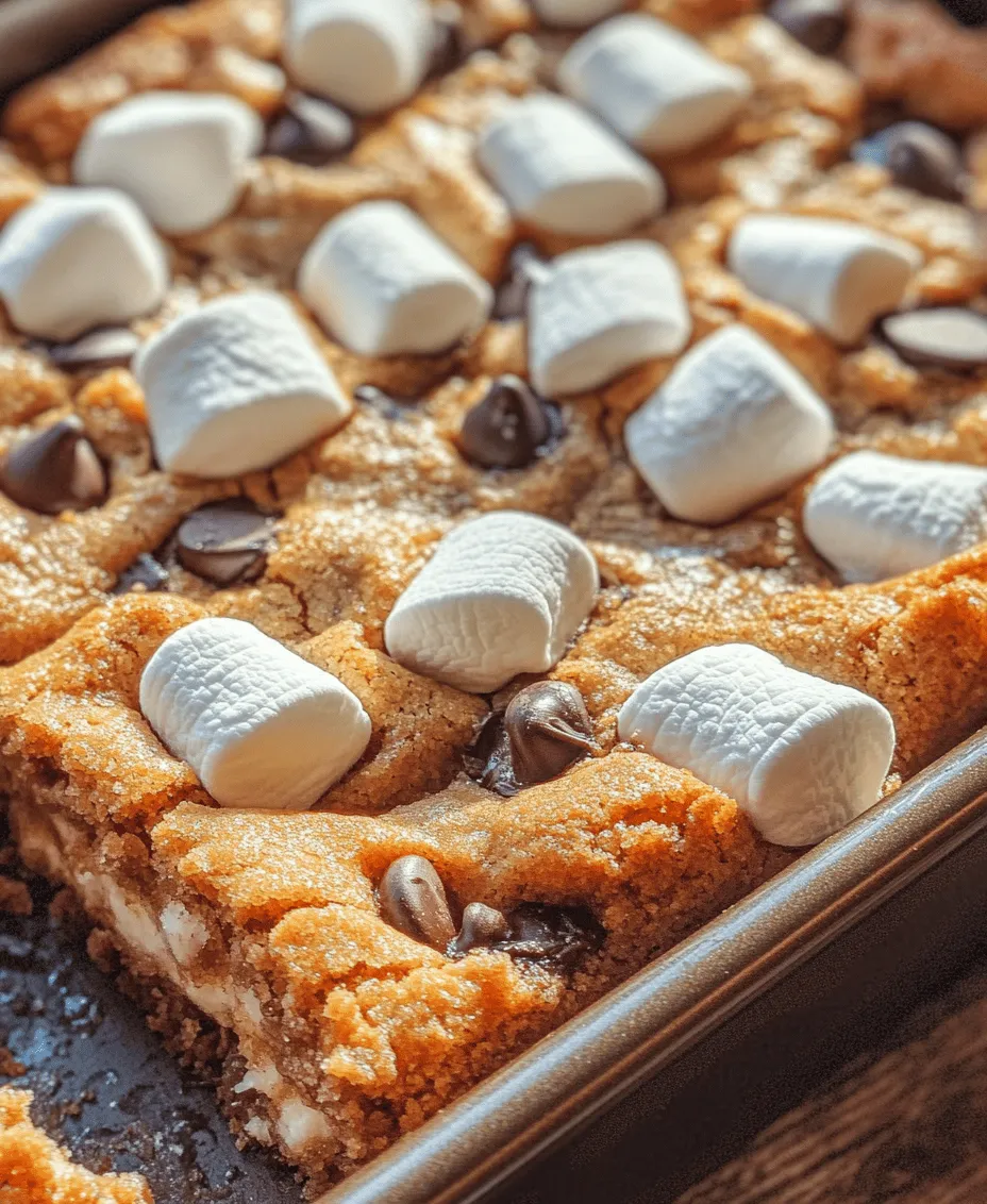 There’s something undeniably nostalgic about s’mores. The mere mention of these beloved campfire treats conjures up images of summer nights spent gathered around a crackling fire, laughter filling the air as gooey marshmallows meld with rich chocolate and crispy graham crackers. S’mores have long been a staple of outdoor gatherings, evoking memories of childhood adventures and family camping trips. However, as much as we adore the traditional presentation of s’mores, there’s a delightful innovation that brings this classic flavor combination into the modern kitchen: S'mores Cookie Bars.