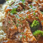 When preparing your Easy Slow Cooker Beef and Broccoli Delight, it's crucial to layer your ingredients correctly to ensure even cooking and maximize flavor. Start by placing the beef at the bottom of the slow cooker. This allows the meat to absorb the juices and flavors from the sauce as it cooks. Next, add your vegetables, beginning with the denser ones such as carrots or onions, if using, and topping them with the broccoli. The broccoli should be added later in the cooking process, but if you prefer to layer it in beforehand, keep it on top to prevent overcooking and mushiness.